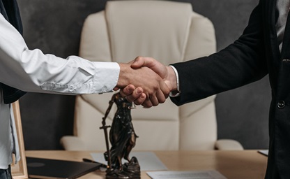 Industrial Coating Consultant Shaking Hands